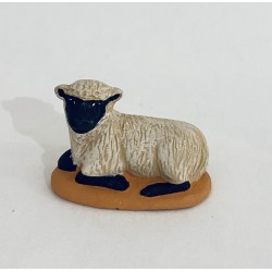 Mouton couché tête noire,...