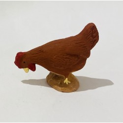 Poule rousse picorante,...