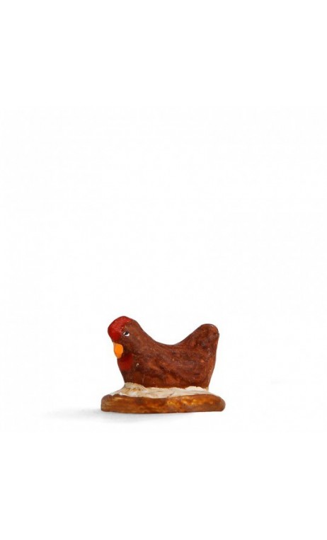 poule qui couve brune