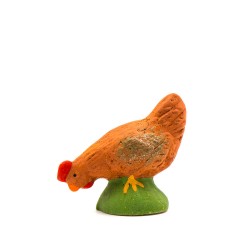 Poule picorant rousse...
